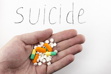Inscription suicide a handful of pills