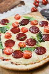 Tasty Pizza With Tomato Sauce, Pepperoni Sausage, And Mushrooms On Wooden Background Natural Rustic, A Pizza Cutter And Ingridienty.