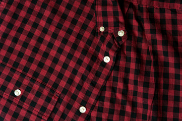 Red and black classic checkered cotton fabric. Plaid texture, male cloth design