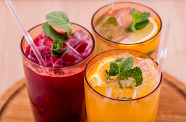 Lemonades from natural berries and fruit with mint and ice