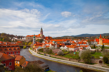 Naklejka na ściany i meble Aerial view of old town of Cesky Krumlov witth the castle tower, Czech republic. Bright spring time.