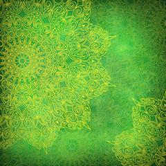 Green background with yellow lace mandala.