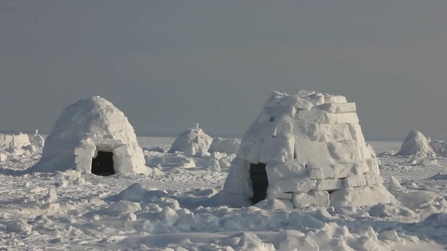 Winter dwelling of Eskimos. Igloo. Eskimos village. 