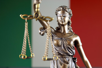 Symbol of law and justice with Italy Flag. Close up.