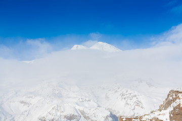Fototapeta na wymiar Mountain day winter. Elbrus