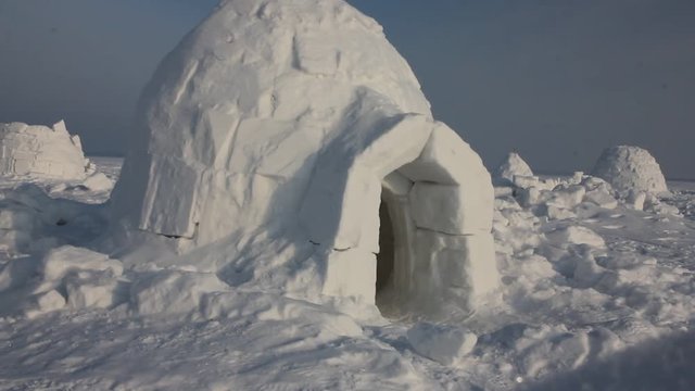 Winter dwelling of Eskimos. Igloo. Eskimos village. 