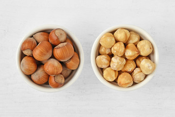 Hazelnuts with and without shell in bowl