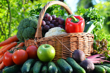 Variety of fresh organic vegetables and fruits in the garden
