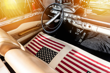 USA flag on seat of a car