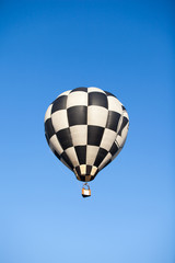 Colorful hot air balloon fly over the blue sky