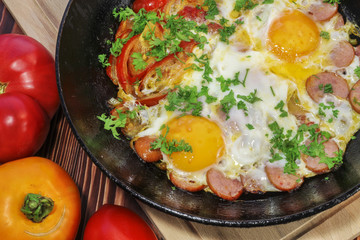 Fried eggs with vegetables