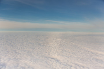 Fototapeta na wymiar white fluffy clouds and blue sky