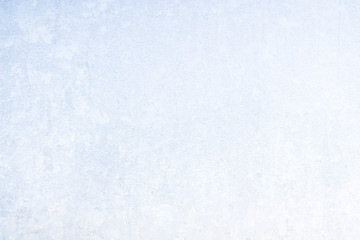 Winter frosty patterns on the frozen ice window