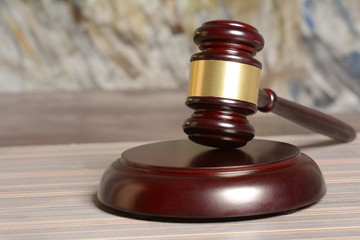 Wooden Gavel with stang on table background