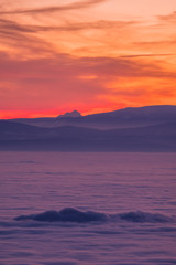 View from Schoeckl over low stratus to Triglav and sunset