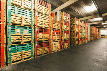 warehouse with boxes of wine