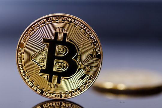 Gold Bitcoin, coins virtual crypto currency on dark backgound