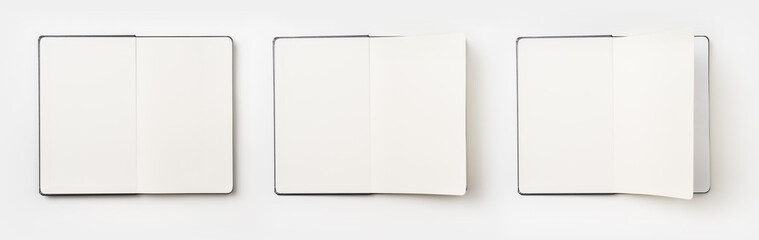 Business concept - Top view collection of black hardcover notebook, white open & flip curl rolled page isolated on background for mockup