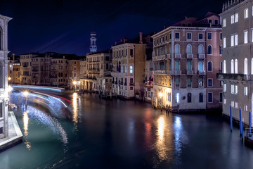 Games of light on the illuminated Grand Canal in the evening, Venice, Italy