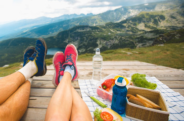 Legs of traveler couple
