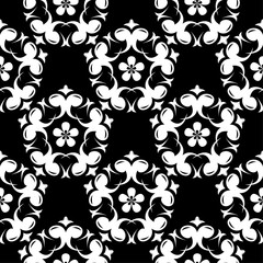 White flowers on black background. Ornamental seamless pattern