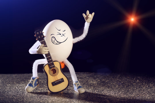 Funny egg rocker guitarist