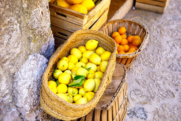 Fresh ripe lemons on a market in old village. Spain