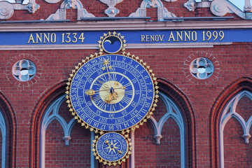 Old clock on House of the Blackheads in Riga