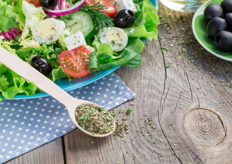 Salad with fresh vegetables, feta cheese and greek olives.
