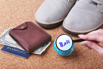 Set of men's accessories for the tourist on a white wooden background. The concept of fashion, leisure and travel.