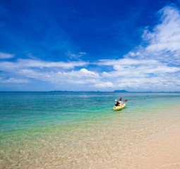 Thailand. Sea Phi Phi, woman and man kayaking