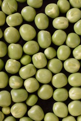 side view of green peas at kitchen. 