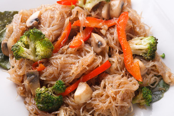 Asian food in a bowl at white background
