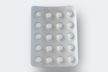 The bottle of pills on white background