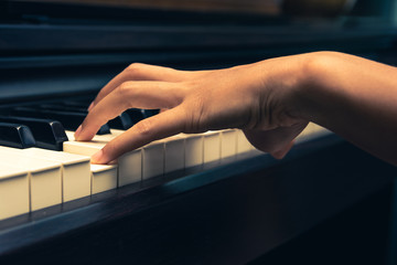 Fototapeta na wymiar A pianist is playing piano.