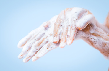 A woman is taking a shower.