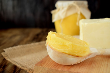 Melted butter in a wooden spoon