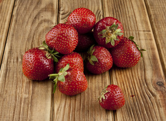 fresh strawberry fruit on a wooden table