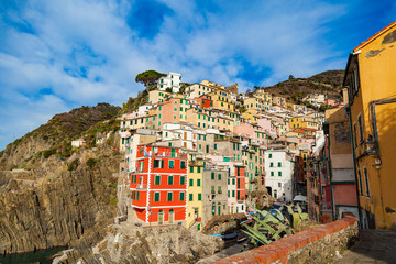Fototapeta na wymiar View of architecture of Riomaggiore town. Riomaggiore is one of the most popular town in Cinque Terre National park, Italy