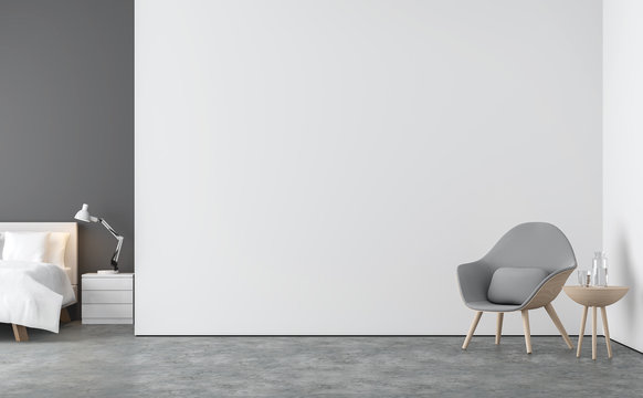 Fototapeta Minimal style  living room and bedroom 3d rendering image.There are concrete floor,white and gray wall.Finished with white bed and gray fabric lounge chair.