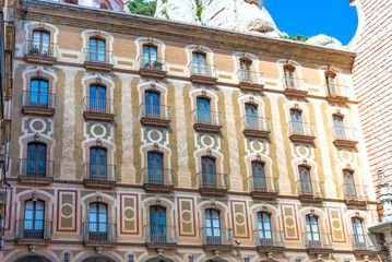 Details of the facade of the Monastery of Santa Maria de Montserrat on the mountain of Montserrat,...