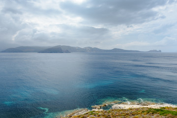 Amazing view of blue sea waters and cloudy sky. Milos island, Cyclades, Greece