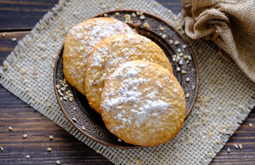 Homemade oat bran cookies on rustic background
