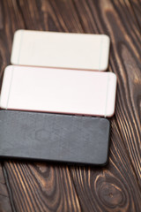 Smart phone on wooden table background with copy space