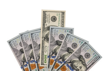 Isolated hundred dollar bills on a white background