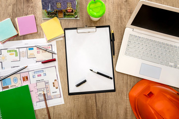 architectural plan of the house, laptop, helmet, layout, folder