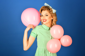 Pin up woman with balloons, birthday.