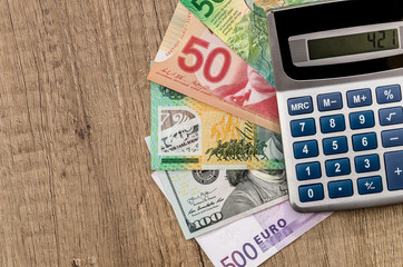 American dollars, European euro, Swiss franc, Canadian dollar, australian dollar  bills
