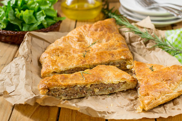 Meat pie with puff pastry, minced beef and potatoes