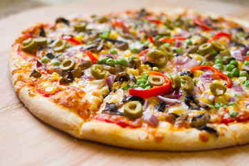 delicious vegetarian pizza on wood